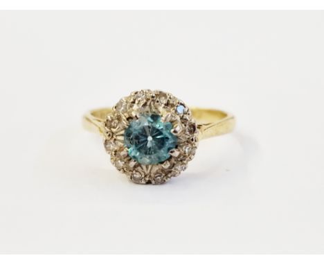 9ct gold zircon and diamond ring, set single blue stone to centre and surround of tiny diamonds size K, 3.4g gross approx.&nb