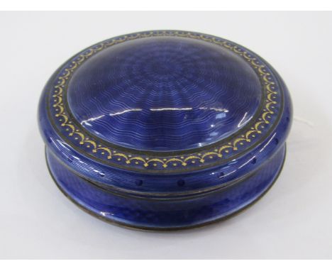 Continental enamel and gilt metal trinket box with blue and gilt enamel and engine turned decoration, 7.5cm diameter. Conditi