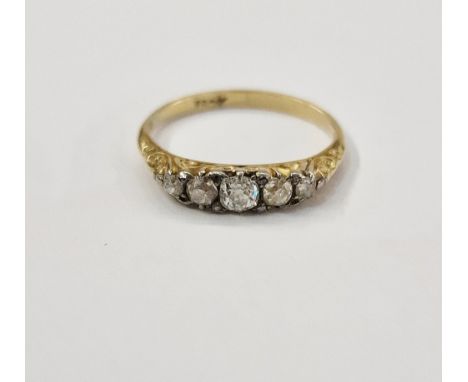 18ct gold and five-stone diamond ring, set graduated stones on scroll engraved shoulders, size P&nbsp;