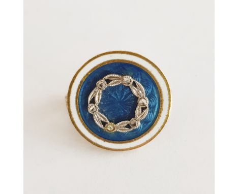 Blue and white enamel and diamond brooch, circular with white outer ring and blue guilloche enamel, set wreath of six tiny di