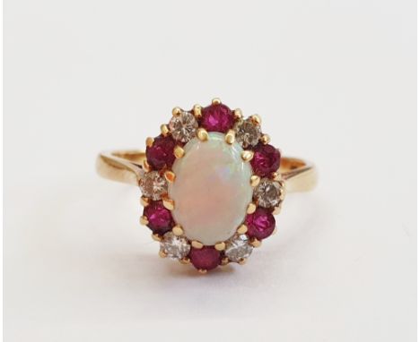 18K gold, opal, garnet and diamond ring&nbsp;set centre oval opal and surround of six garnets and six diamonds size N