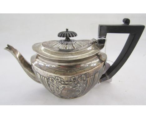 Victorian silver teapot, oval with gadrooned ebonised finial and angular handle, the oval shouldered body with floral repouss