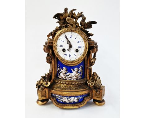 Late 19th century French Sevres-style gilt-metal, porcelain and enamel mounted mantel clock, surmounted with a scythe, corn a