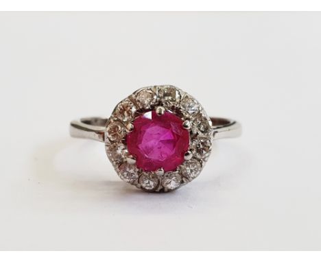 18ct white gold, ruby and diamond cluster ring set centre ruby with surround of 12 diamonds size P&nbsp;Condition ReportThe r