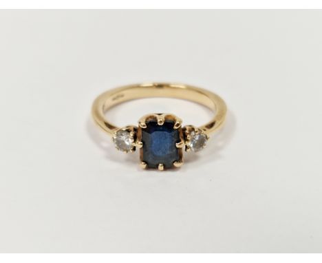 9ct gold, sapphire and diamond ring, the rectangular sapphire flanked by two claw-set diamonds size M