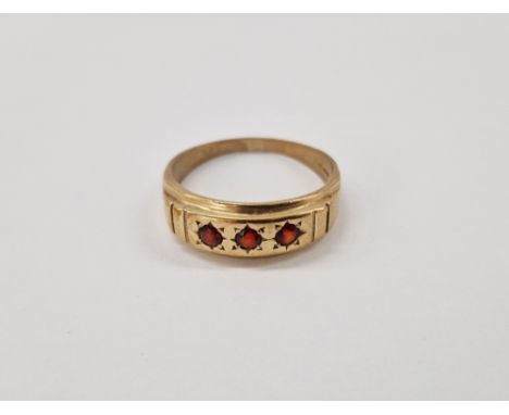 9ct gold and ruby ring, gypsy set three circular stones size X, gross weight 3.4g&nbsp;