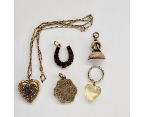 Gold-coloured metal and garnet horseshoe-shaped pendant, a 9ct gold chain, plated locket&nbsp;set with pearls and pink stones