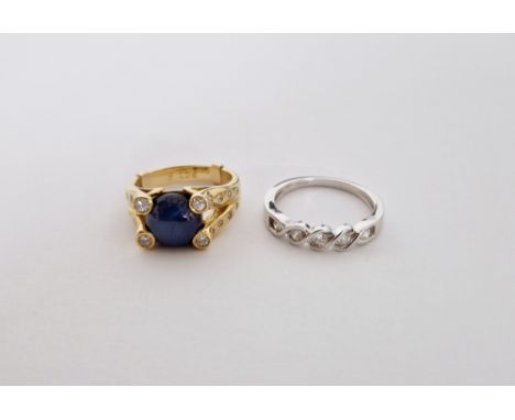 9ct yellow gold, diamond and blue stone dress ring, cabochon stone possibly cat's eye size N and a&nbsp; sapphire and platinu