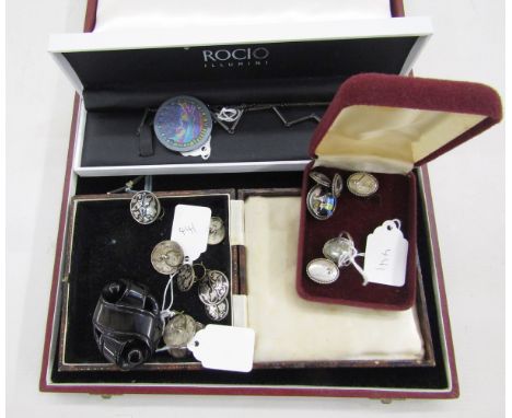 Brooch, earrings. ring and two pairs of earrings, with pictures created by butterfly wings, backed with silver, a set of Thai