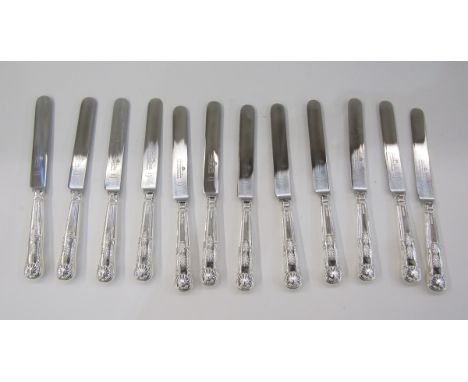 Set of eight silver-handled table knives, queens pattern, marks rubbed, the blades stamped 'Harrison Bros and Howson' and a m