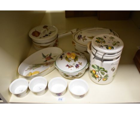 A collection of Royal Worcester 'Evesham' and a similarly designed storage jar, including Tureen and serving dish.