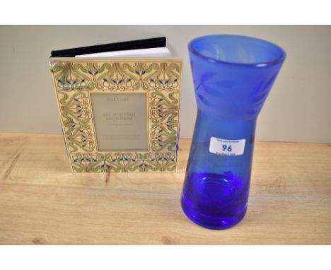 A Caithness etched blue glass vase, stamped to the underside and of waisted form, measuring 20cm tall, together with a Past T