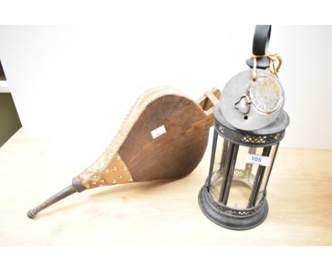 A 19th Century tin lantern, with six glass side and reticulated design, measuring 32cm tall, and a pair of Victorian studded 