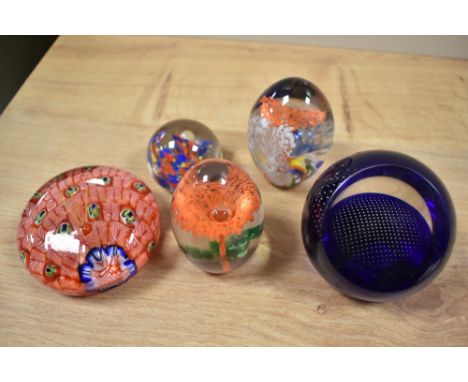A selection of paperweights, including 20th century Chinese paperweight with multiple canes replicating a peacocks feathers a