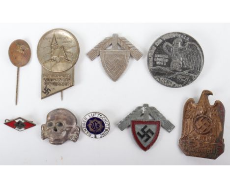 WW2 German Badges: Day badges, RAD cap badge , RLB enamel badge, cap skull and more. 9 items 