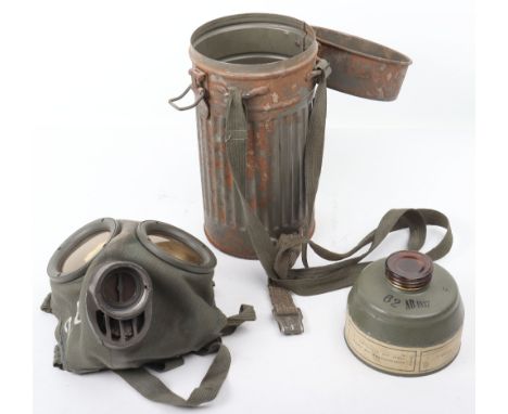 WW2 German Civil Defence / Luftschutz Pattern Gas Mask, in near mint condition with the original paper label still remaining 