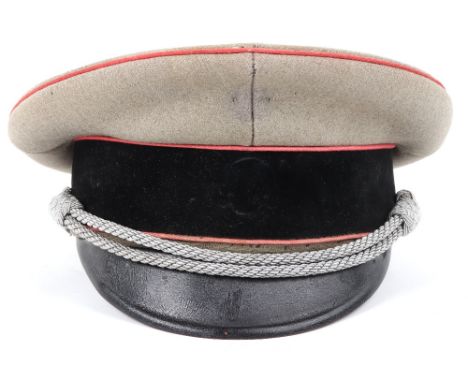 WW2 German Waffen-SS Officers Peaked Cap, Red piped hat with officers chin strap and black felt central band, evidence of Waf