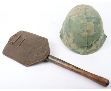 American Vietnam War Period M1 Steel Helmet, being a rear seam swivel bale example with camouflage cover and fibre removable 