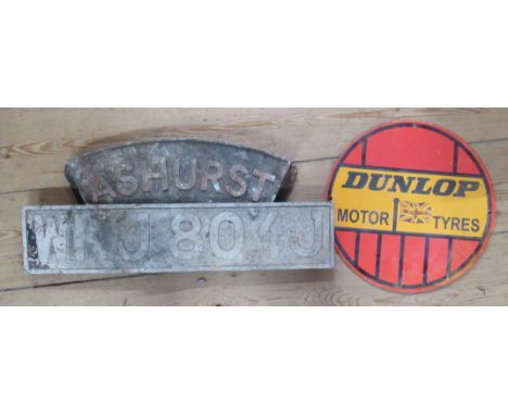 A Dunlop Motor Tyres circular enamel sign, diameter 12ins, together with an Ashurst metal sign