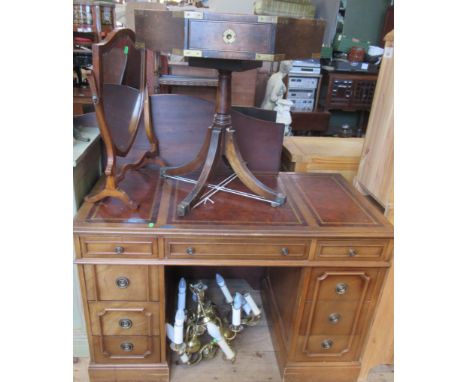 A reproduction kneehole desk, together with a mahogany octagonal table, a dressing table mirror and two brass hanging light f