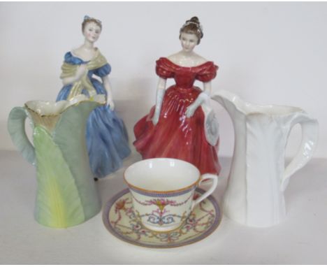 Two Royal Worcester cabbage leaf moulded jugs, together with a Bessborough pattern cup and saucer and two Royal Doulton figur