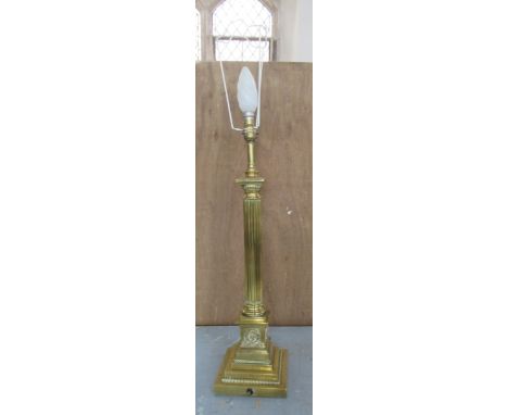 A brass column table lamp, height 29ins