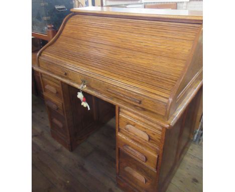 A vintage roll top desk width 48ins, height 48ins , depth 30ins&nbsp;