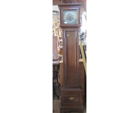 An oak cased grandmothers clock