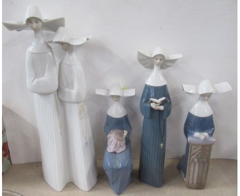 Four Lladro models of nuns