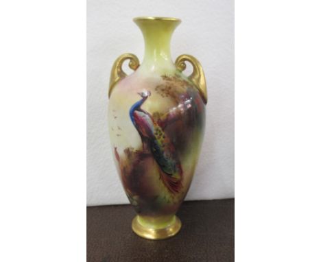 A Royal Worcester vase, decorated with peacocks and foliage by Southall, shape number H287, height 5ins