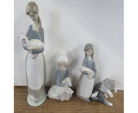 Three Lladro models, of children with animals and a Lladro model of a kitten and a mouse