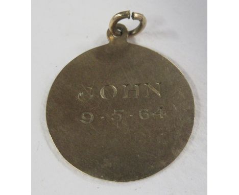 A 9ct gold disc, weight 3g