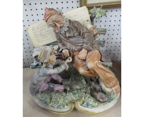 A Capo di Monte model, of an old man on a bench with boy seated on the ground