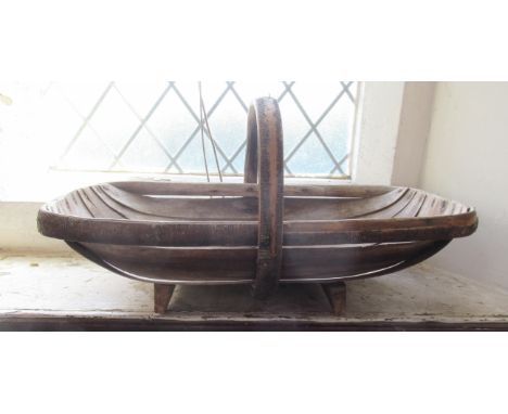 A wooden trug