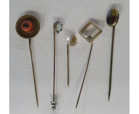 Five gold coloured stick pins, one set with an opal and 6 small diamonds, total weight 9.6g