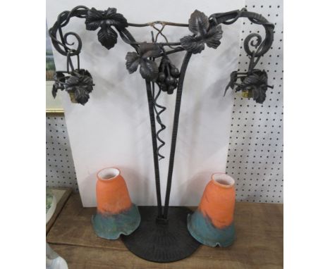 A metal table lamp, with vine decoration and two coloured glass shades, height 20ins