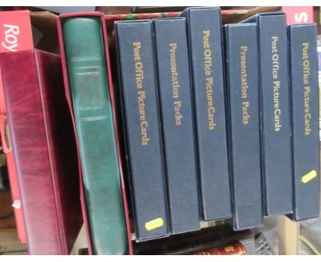 A collection of folders containing Post Office Picture Cards, The Penny Black Anniversary Book and various Royal Mail Special