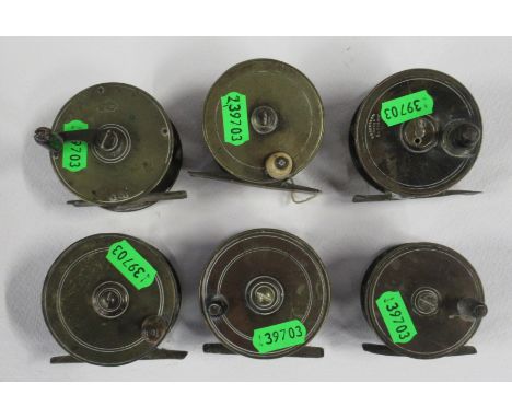 A Charles Farlow brass fishing reel, spool diameter 2.5ins, together with a Robertson Glasgow brass fishing reel, an A. W. Ga