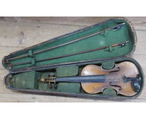 A cased Wolff Bros violin, and two bows, one bow stamped