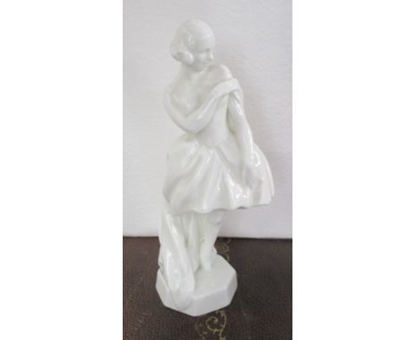 An unmarked Royal Worcester blank figure, of a girl modelled by Doris Lindner, height 6.75ins