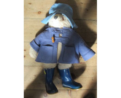 A Gabrielle Design Paddington Bear teddy, with blue hat, blue coat and blue wellies