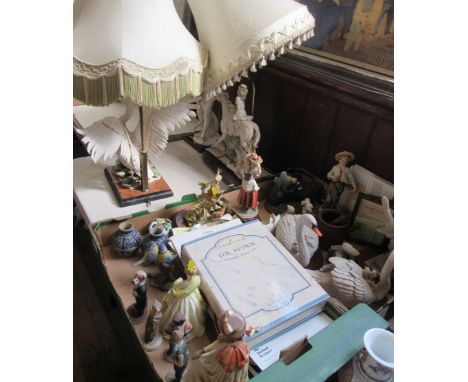 A collection of ornaments, resin models, lamp bases etc