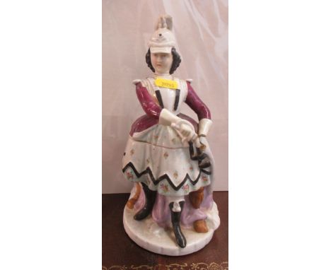 &nbsp;A Continental porcelain jar and cover, modelled as a woman drawing a sword, af, height 10.25ins