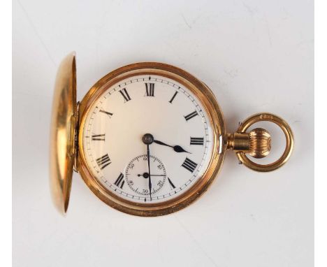 An 18ct gold hunting cased keyless wind lady's fob watch, the jewelled lever movement detailed 'Swiss Made 20523', gold inner