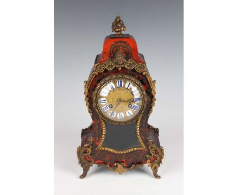 A late 19th century French gilt metal mounted and red tortoiseshell boulle cased mantel clock with eight day movement strikin