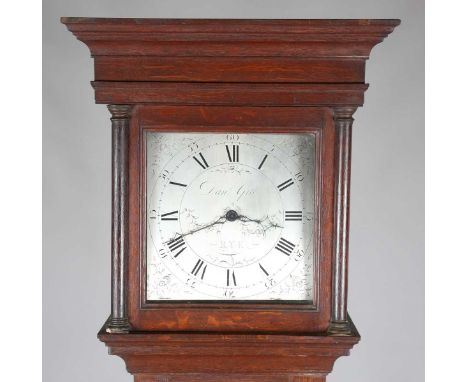 A George III oak longcase clock with thirty hour movement striking on a bell via an outside countwheel, the 11-inch square si