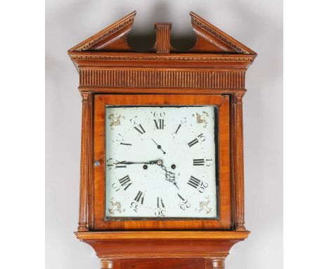 An early 19th century mahogany longcase clock with eight day movement striking on a bell, the 13-inch square painted dial wit