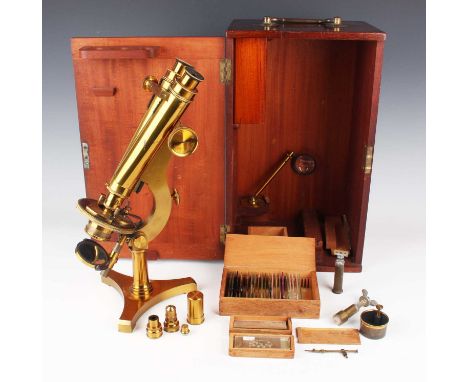 A late Victorian lacquered brass binocular microscope by R. &amp; J. Beck of London and Philadelphia, numbered '11449', with 