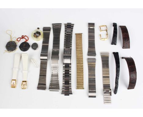 A collection of assorted watch parts and accessories, including an Ebel lady's wristwatch movement, bracelets, dials and vari