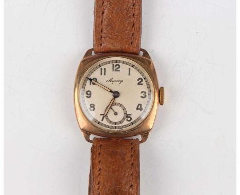 A 9ct gold cushion cased gentleman's wristwatch, the jewelled lever movement detailed 'Marc Favre Switzerland', the silvered 